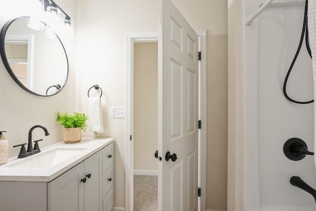 bathroom featuring vanity and walk in shower