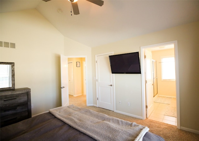 unfurnished bedroom featuring ensuite bathroom, carpet flooring, visible vents, baseboards, and tile patterned floors