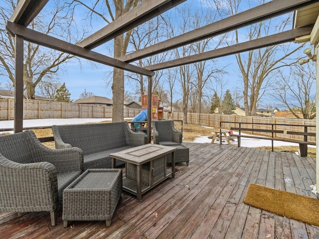 deck featuring an outdoor hangout area and a fenced backyard