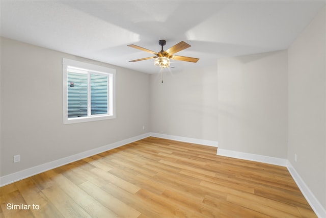 712 Academy Cir, Nevada, IA 50201 - spare room with light wood-style floors, ceiling fan, and baseboards