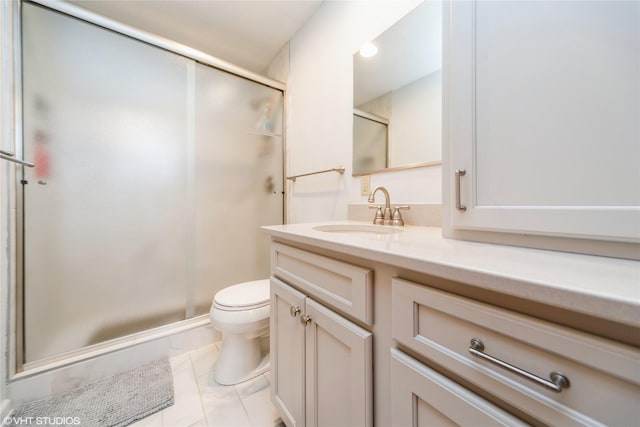 full bath with toilet, a shower stall, tile patterned flooring, and vanity