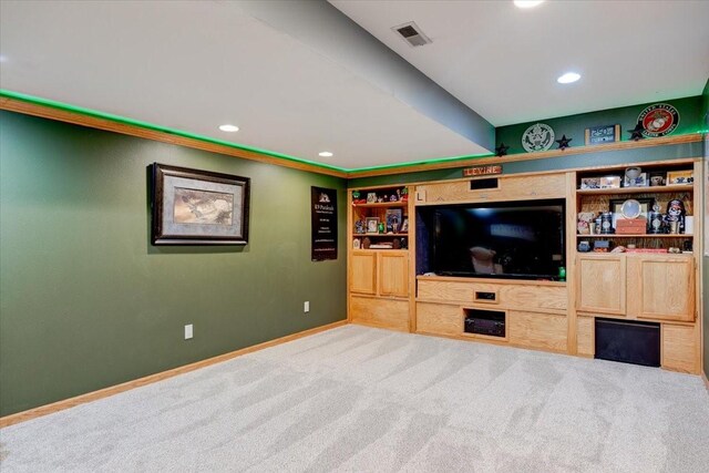 7087 Hillcrest Ct, Johnston, IA 50131 - living area featuring carpet floors, baseboards, recessed lighting, and built in shelves