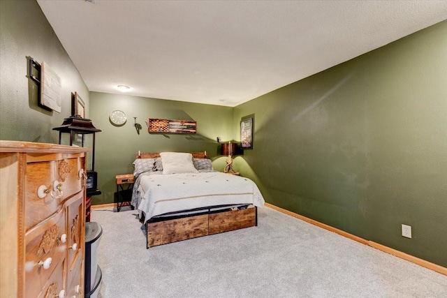 7087 Hillcrest Ct, Johnston, IA 50131 - carpeted bedroom with baseboards