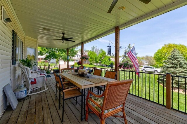 7087 Hillcrest Ct, Johnston, IA 50131 - wooden terrace with a ceiling fan and outdoor dining space