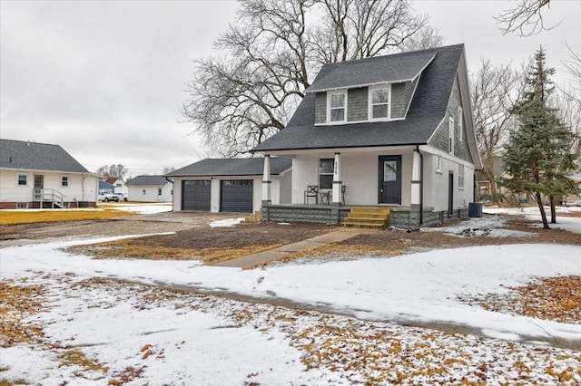 view of front of home with roof with shingles, a porch, a garage, cooling unit, and driveway