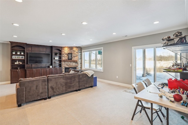 living area with recessed lighting, light colored carpet, and baseboards