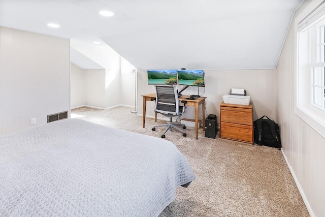 carpeted bedroom featuring vaulted ceiling, visible vents, and recessed lighting