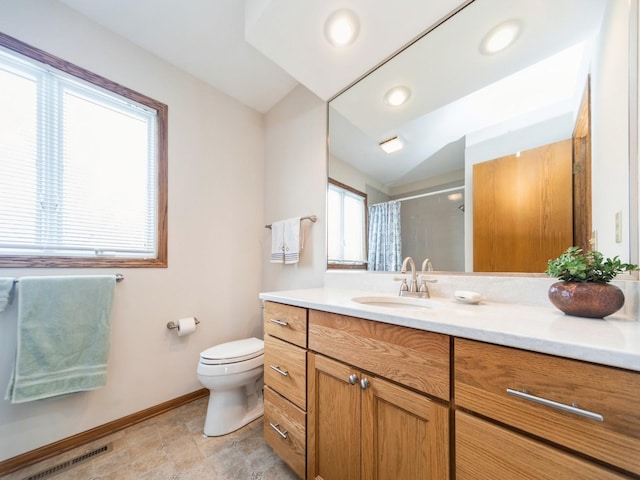 bathroom featuring visible vents, a shower with curtain, toilet, baseboards, and vanity