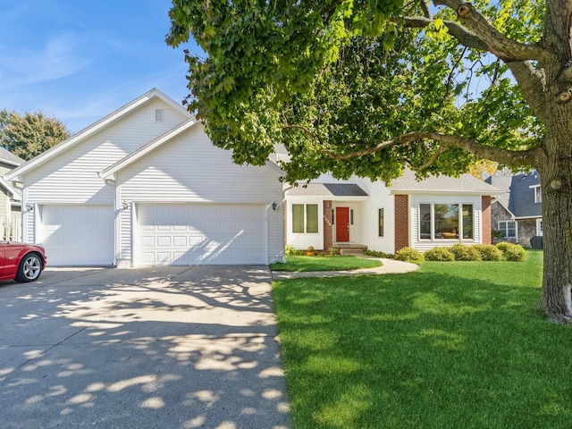 view of front of house with brick siding, an attached garage, driveway, and a front lawn