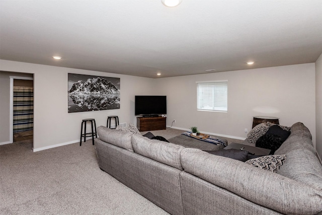 living area with recessed lighting, baseboards, and carpet floors