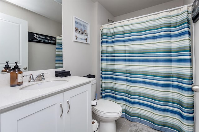 full bathroom with tile patterned floors, toilet, vanity, and a shower with curtain