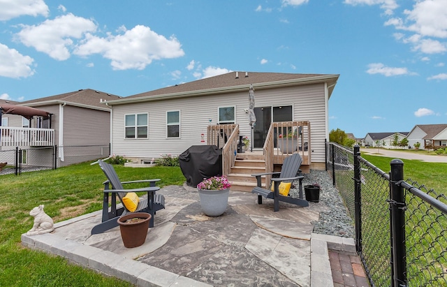 9904 NW 82nd Ave, Johnston, IA 50131 - back of property with a patio and a deck
