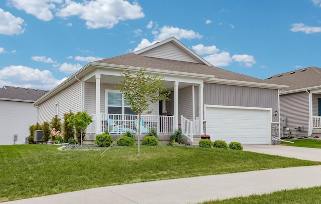 9904 NW 82nd Ave, Johnston, IA 50131 - single story home with covered porch, an attached garage, concrete driveway, and a front yard