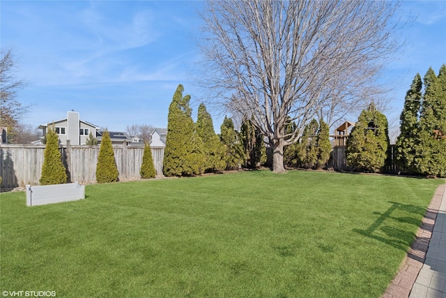 view of yard featuring fence