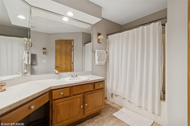 full bathroom featuring vanity, recessed lighting, and shower / bathtub combination with curtain