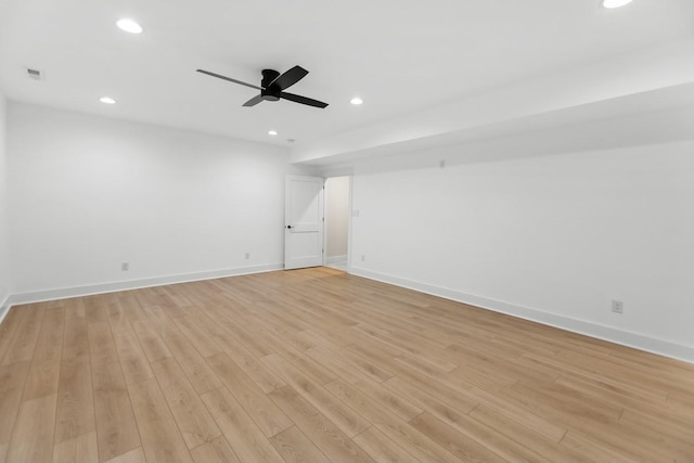 unfurnished room featuring recessed lighting, baseboards, a ceiling fan, and light wood finished floors