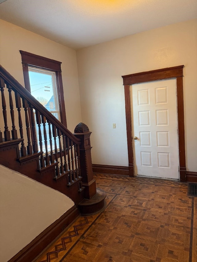 stairway with baseboards