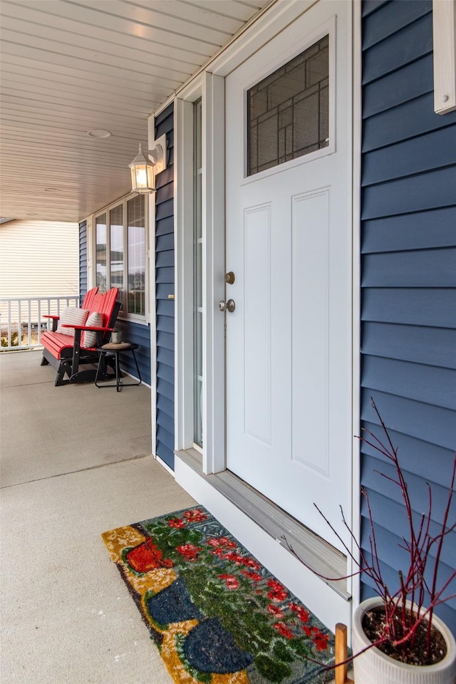 entrance to property with covered porch