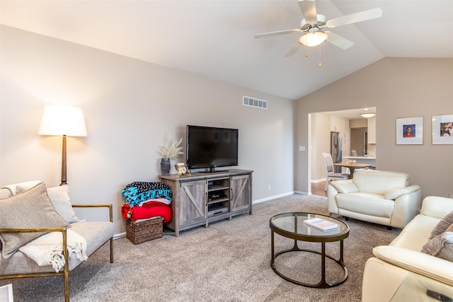 living room with baseboards, visible vents, carpet floors, lofted ceiling, and ceiling fan