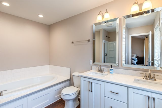 full bath featuring double vanity, a shower stall, connected bathroom, and a sink