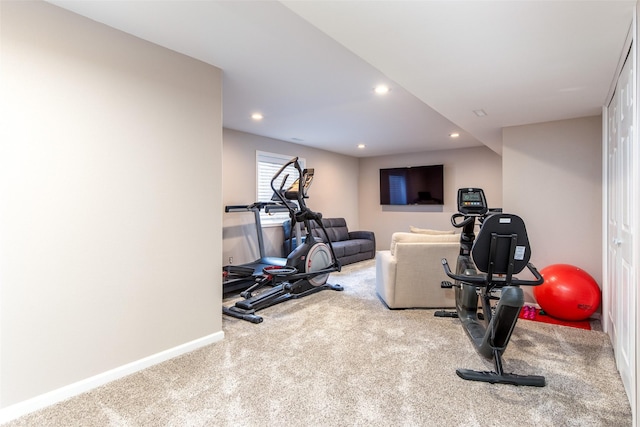 exercise area with recessed lighting, baseboards, and carpet floors