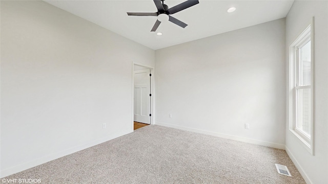 202 Meadowlark Dr, Monroe, IA 50170 - carpeted spare room featuring ceiling fan, recessed lighting, and baseboards