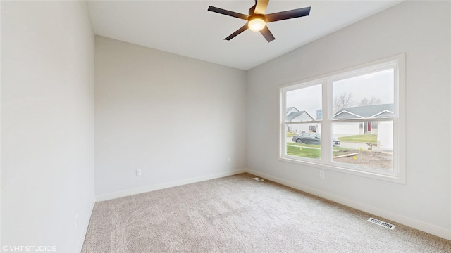 202 Meadowlark Dr, Monroe, IA 50170 - empty room with ceiling fan, carpet flooring, and baseboards