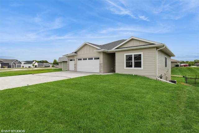 202 Meadowlark Dr, Monroe, IA 50170 - view of front facade with board and batten siding, an attached garage, and concrete driveway