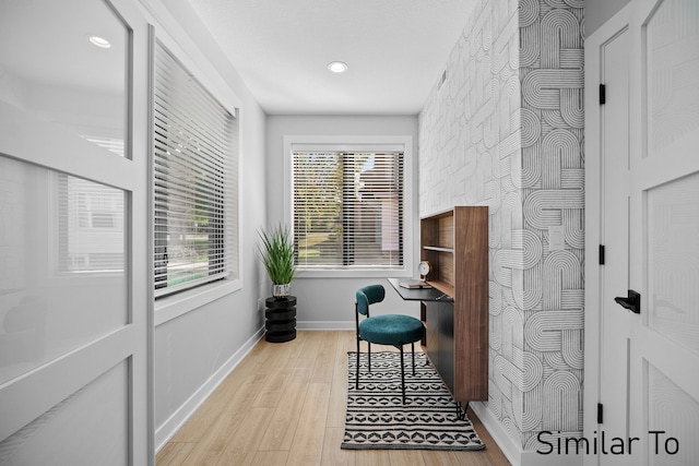 office space featuring recessed lighting, baseboards, and wood finished floors