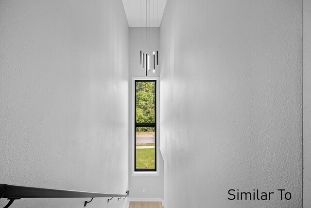 4828 Ingersoll Ave, Des Moines, IA 50312 - stairway with plenty of natural light and baseboards