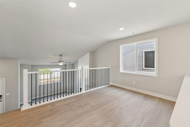 2917 Jerry St, Van Meter, IA 50261 - bonus room featuring light wood finished floors, a ceiling fan, lofted ceiling, and recessed lighting