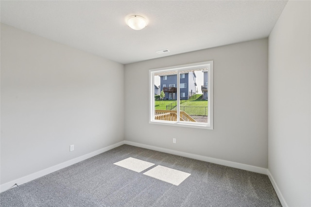 2917 Jerry St, Van Meter, IA 50261 - empty room featuring carpet flooring and baseboards