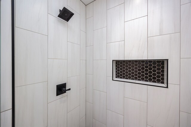 details featuring a tile shower