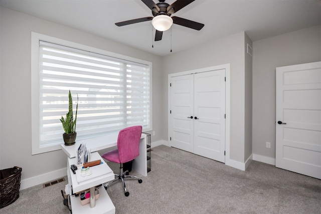 5015 149th Ct, Urbandale, IA 50323 - carpeted office space with a ceiling fan and baseboards