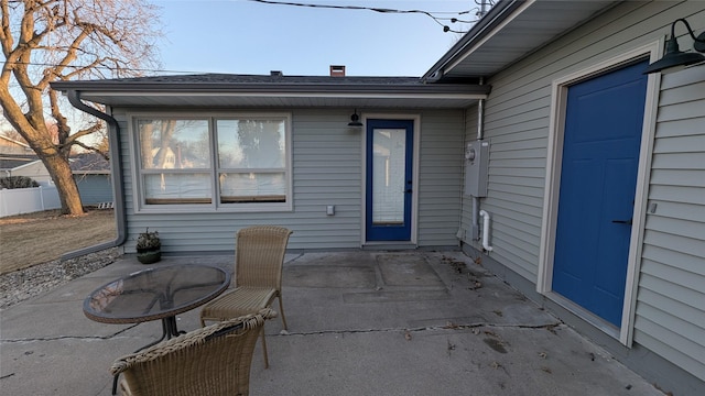 view of patio featuring fence