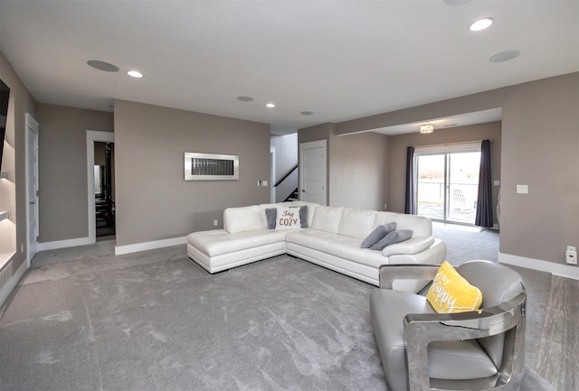 living room with recessed lighting, stairs, baseboards, and carpet floors