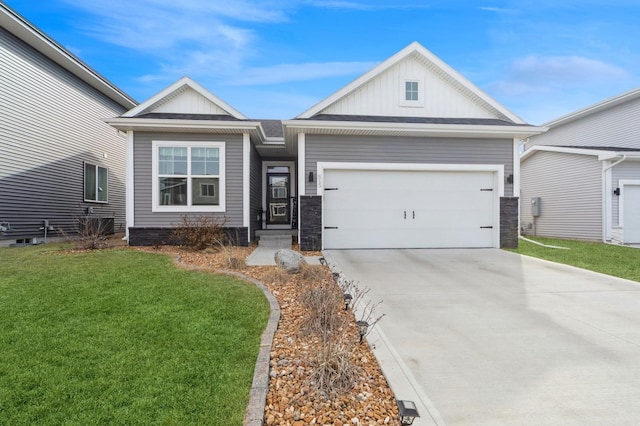 view of front of home with a front lawn, board and batten siding, concrete driveway, and an attached garage