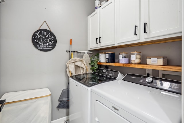 laundry room featuring cabinet space and separate washer and dryer