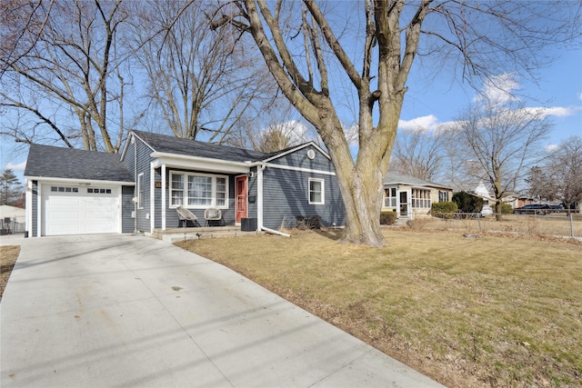 view of front of house featuring a garage, covered porch, concrete driveway, and a front yard