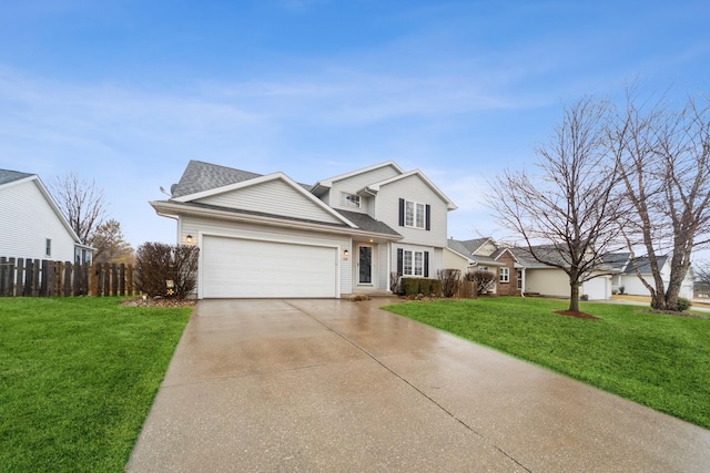 traditional-style house featuring an attached garage, driveway, a front yard, and fence