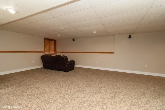 interior space featuring a drop ceiling, recessed lighting, baseboards, and carpet floors