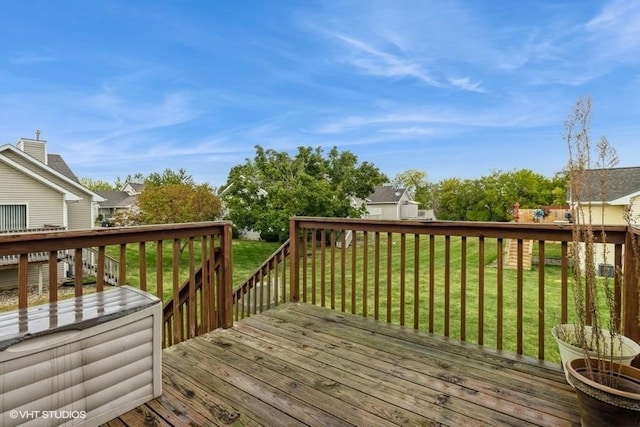 deck featuring a yard