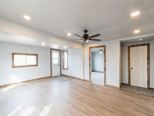 spare room with light wood-style flooring, recessed lighting, baseboards, and ceiling fan