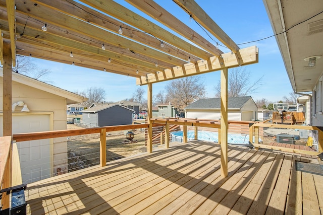 deck featuring visible vents and a pergola