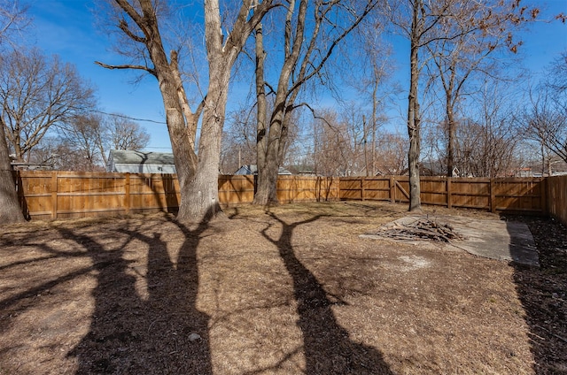 view of yard featuring a fenced backyard