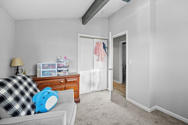 living area with lofted ceiling with beams, baseboards, and carpet