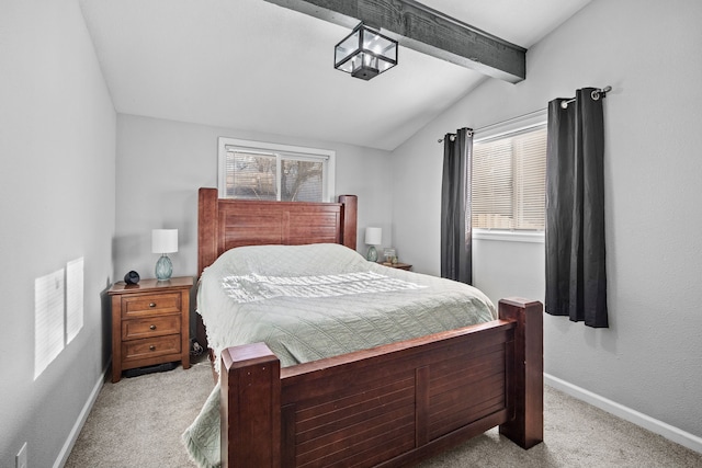 carpeted bedroom featuring baseboards and vaulted ceiling with beams