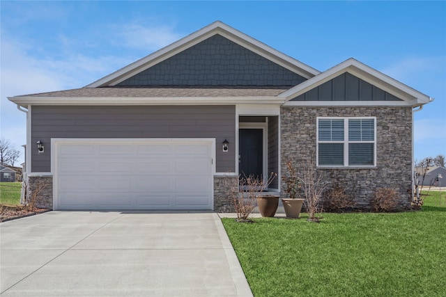 view of front of home featuring stone siding, board and batten siding, concrete driveway, an attached garage, and a front yard