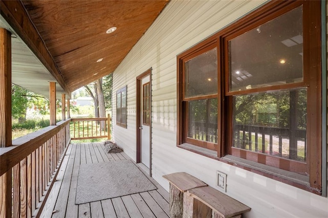 wooden deck featuring covered porch