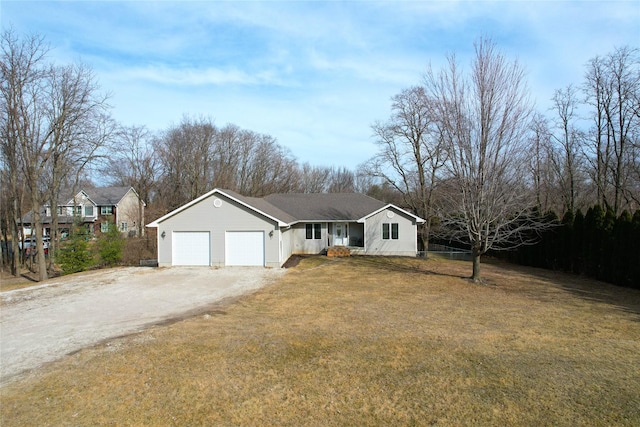 ranch-style home with a garage, fence, a front lawn, and dirt driveway